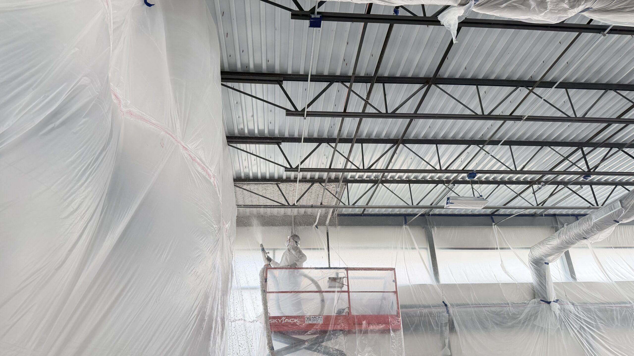 K13 Application of Insulation on a Commercial Building