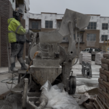 Gypcrete flooring being poured in multifamily construction